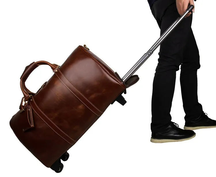 21 inch head layer cowhide trolley bag in brown glossy leather with telescopic handle and wheels