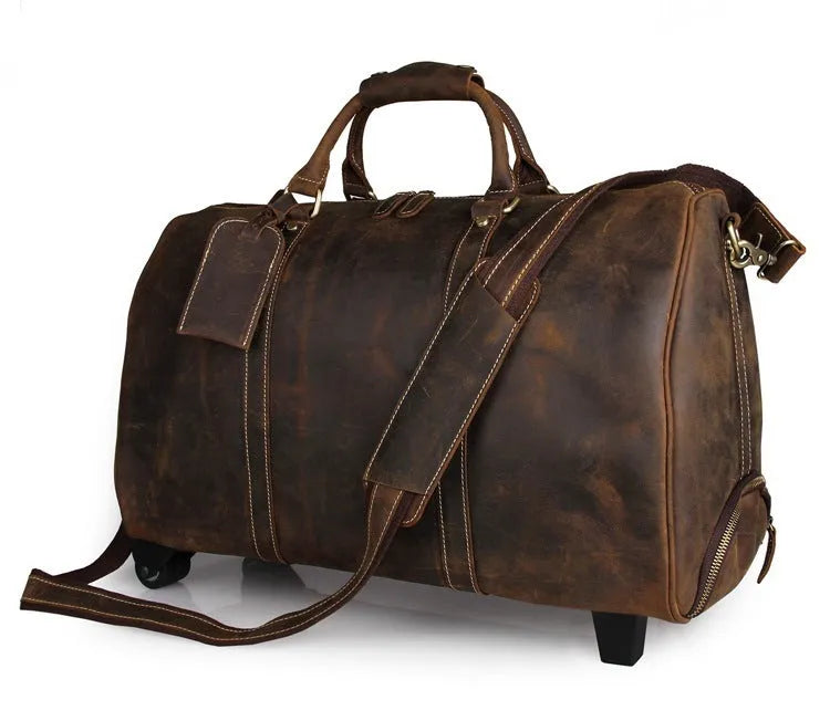 21 inch head layer cowhide trolley bag in brown glossy leather with telescopic handle and wheels