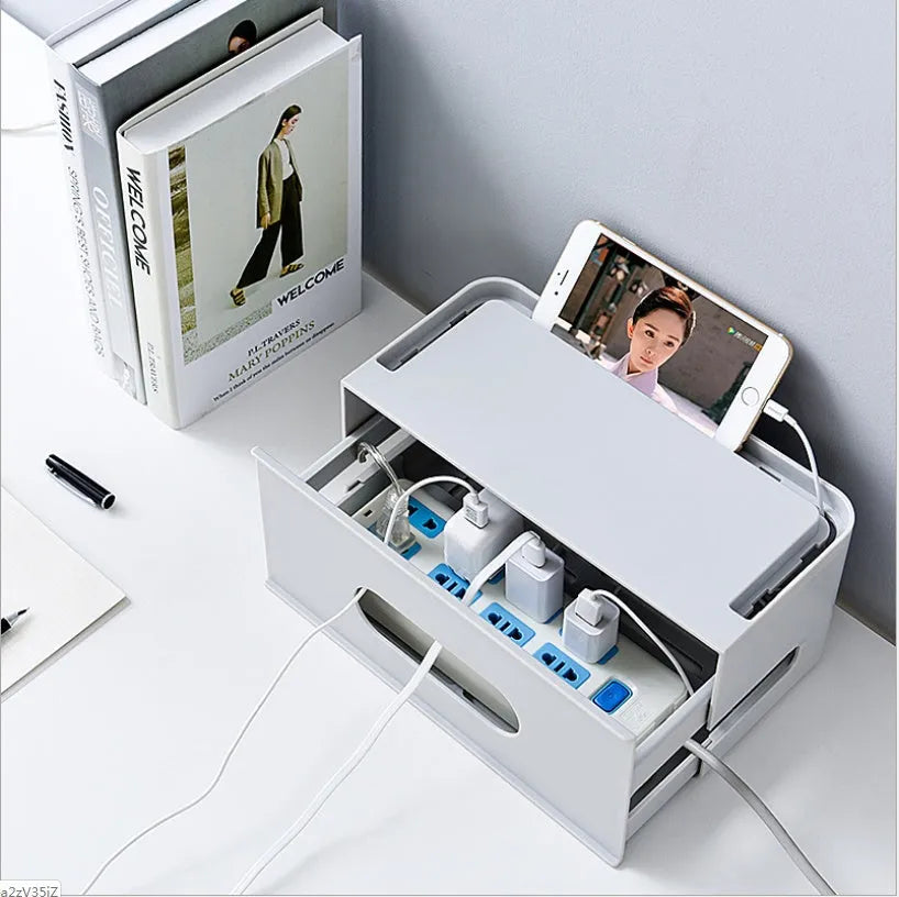 A grey and a white plastic router storage box for organising Wi-Fi routers and network cables.