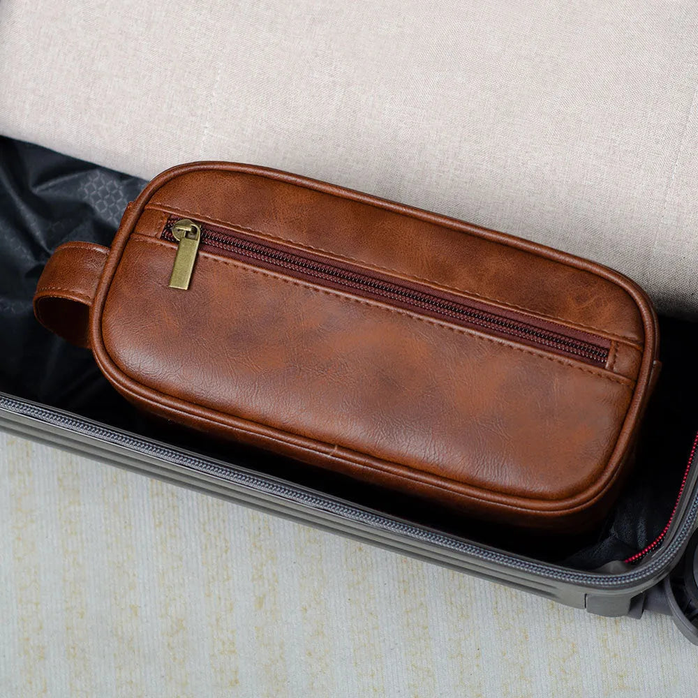 Men's PU leather handheld storage bag in black with sewing seams and zip closure