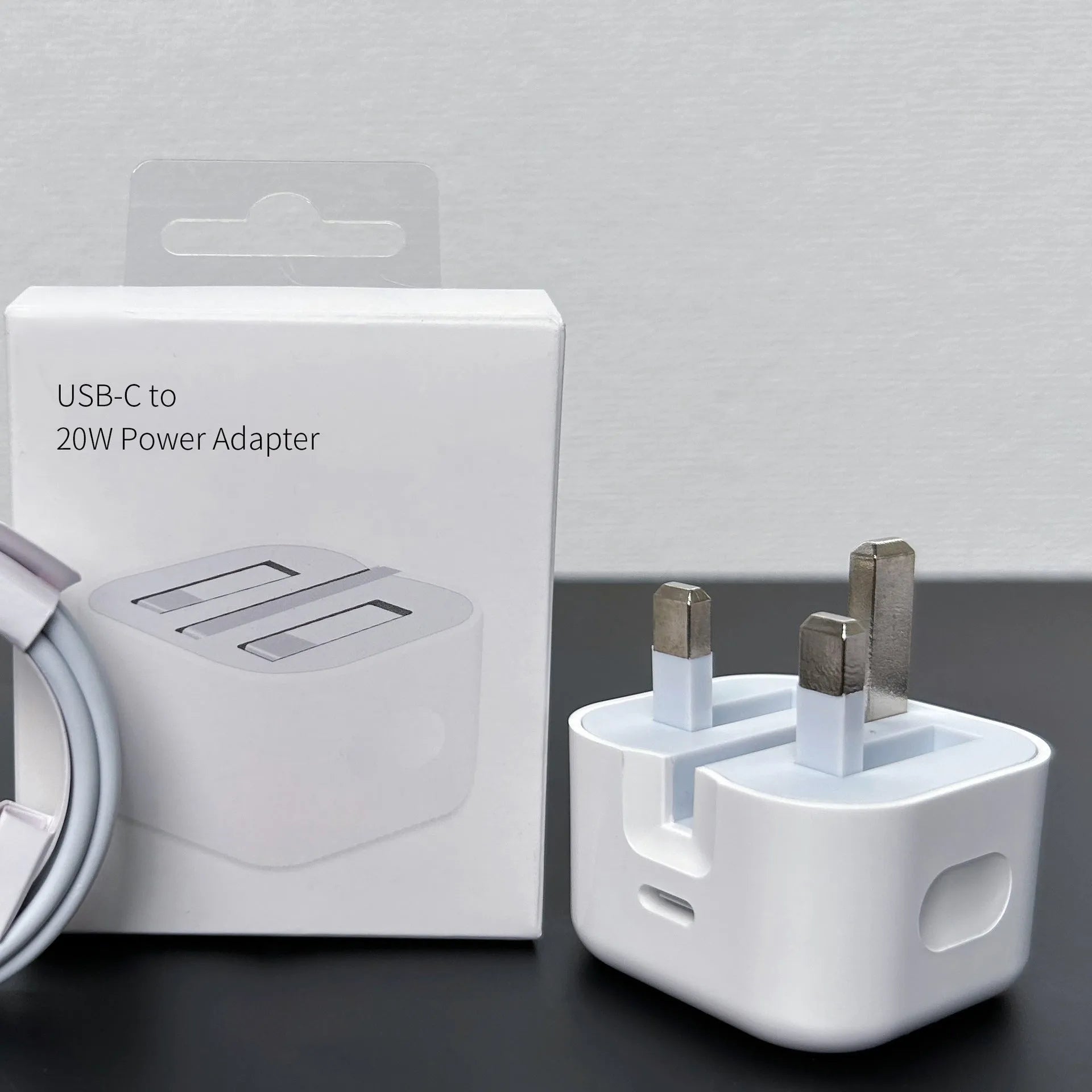 White 20W USB Power Delivery charger with Type-C port and multiple international plug options