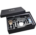 CSB chrome and black shaving set with safety razor, badger hair brush, stand, bowl, blades, and gift box.