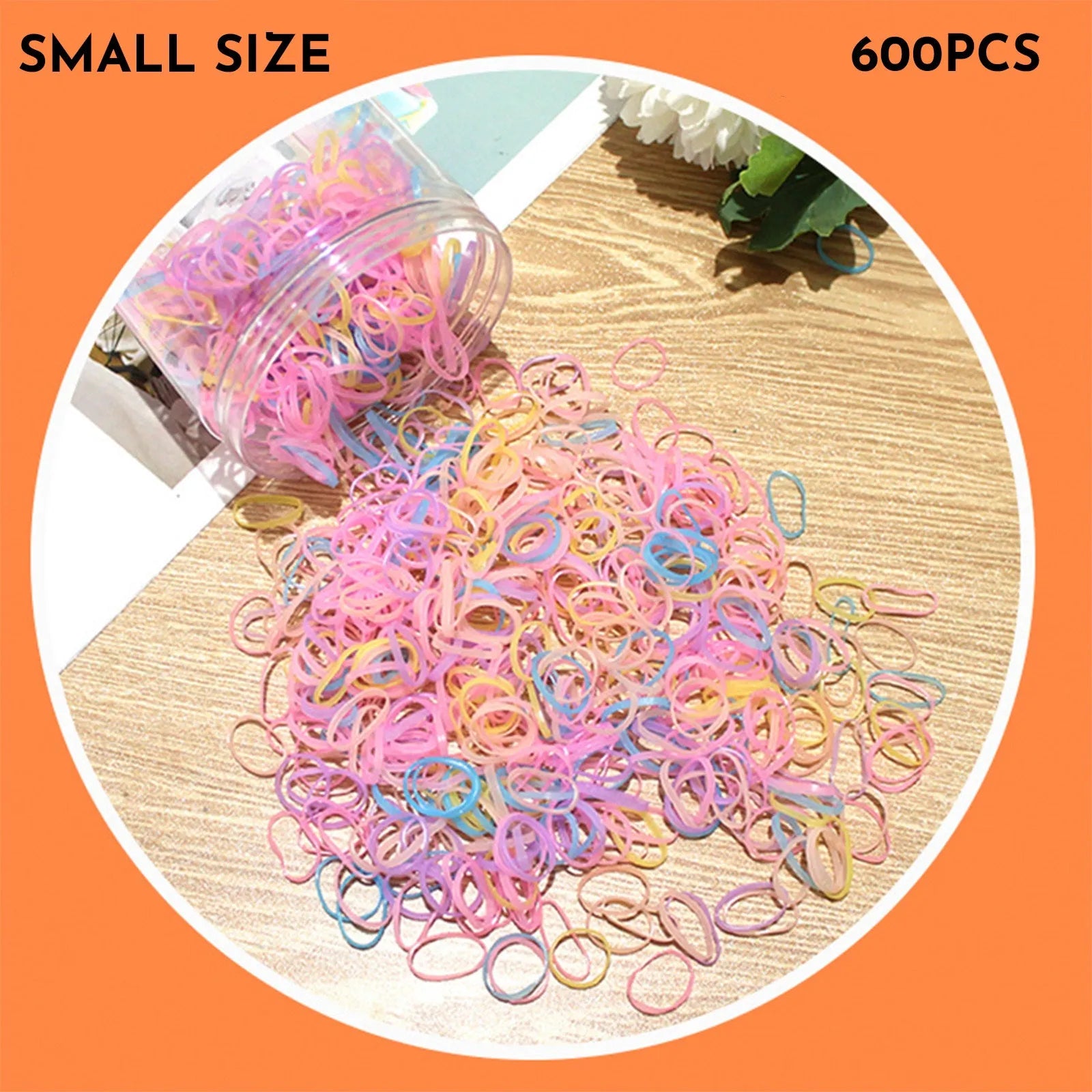Assorted colourful TPU baby hair ties in a reusable plastic container.