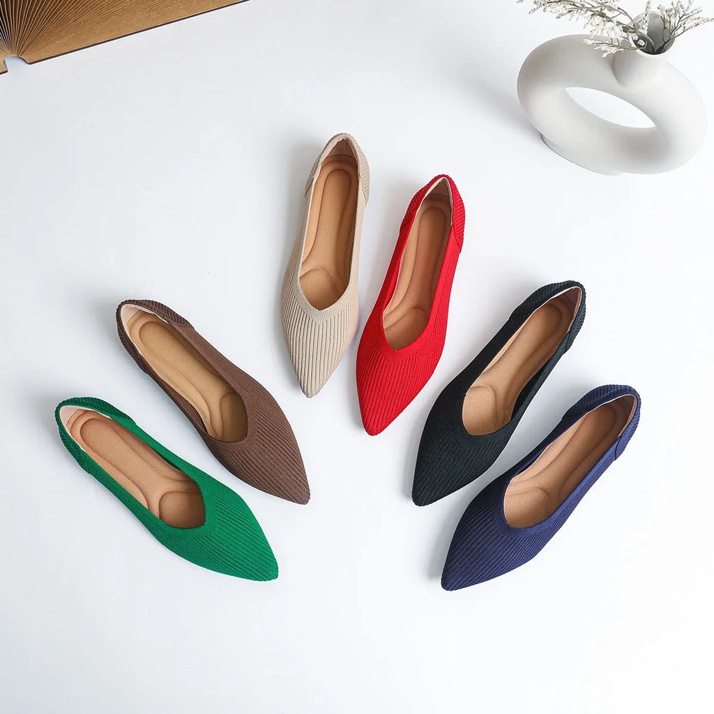 Women's apricot coloured knit flat pumps with a pointed toe and shallow mouth design on a plain background.
