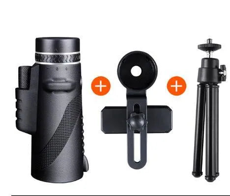 Black 40x60 monocular telescope with mobile phone attachment for photography on a table.