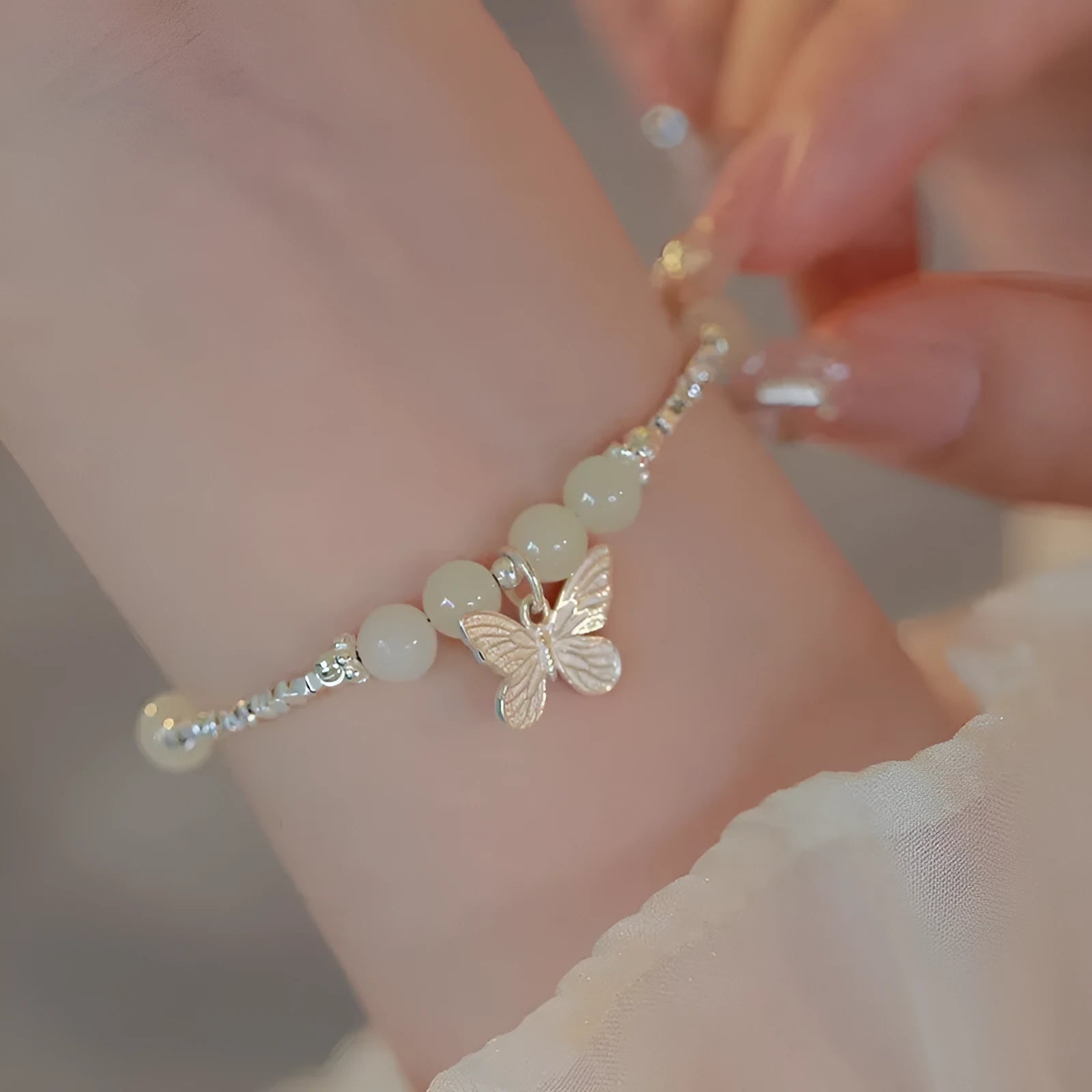 Women's Hetian jale and silver butterfly jewellery set with matching bracelet and necklace
