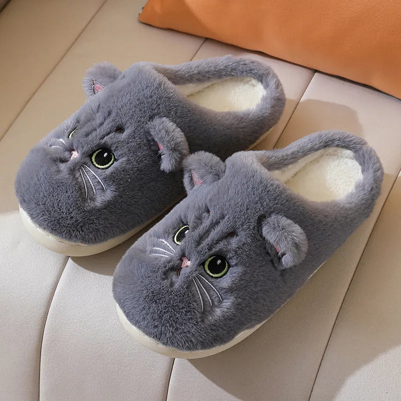 Cute cat plush slippers with non-slip EVA sole, thickened design, available in pink colour on a floor surface