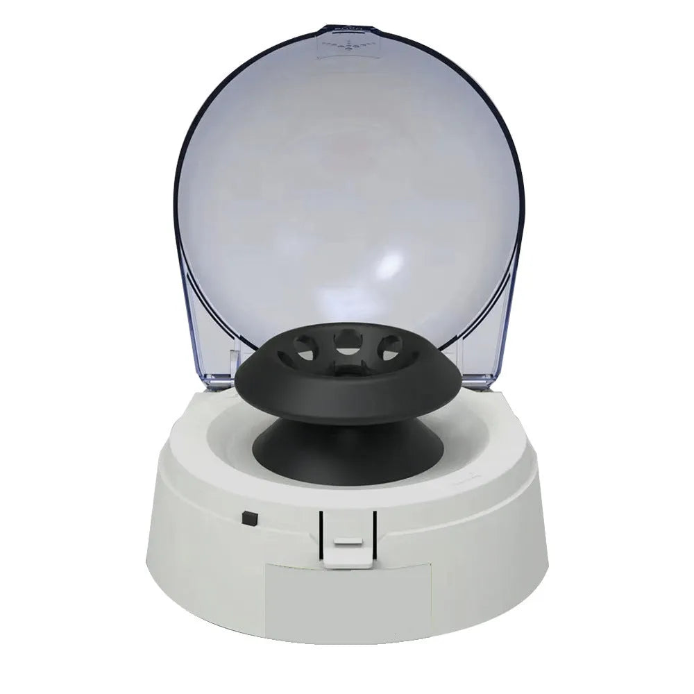 Small white mini centrifuge laboratory equipment on a benchtop