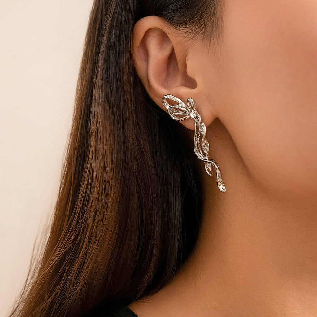 White K bowknot earrings for women, alloy electroplated bow-shaped earrings, one pair
