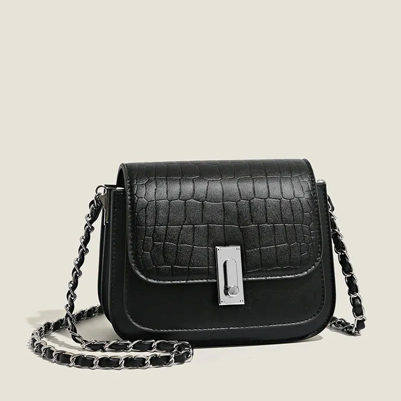 Soft PU women's fashion shoulder bag in horizontal square shape with phone compartment.