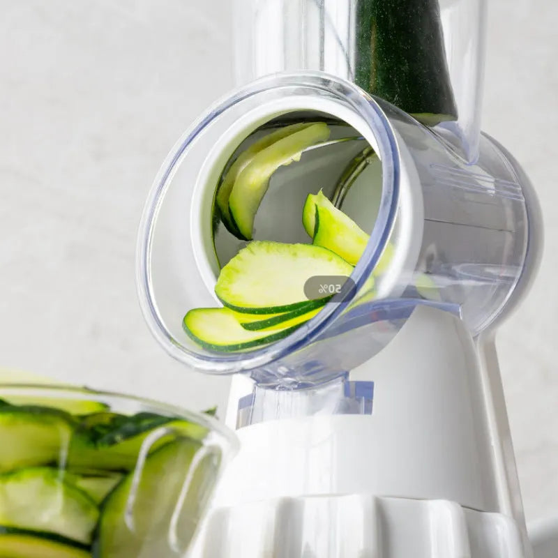 White plastic manual vegetable slicer with rotating drum and suction feet
