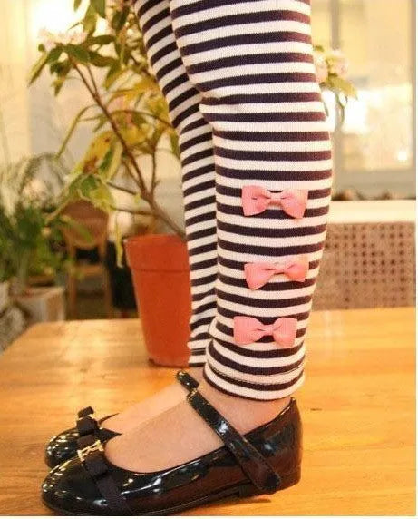 Cotton pink girl clothing set, sizes 110cm to 140cm, on a child