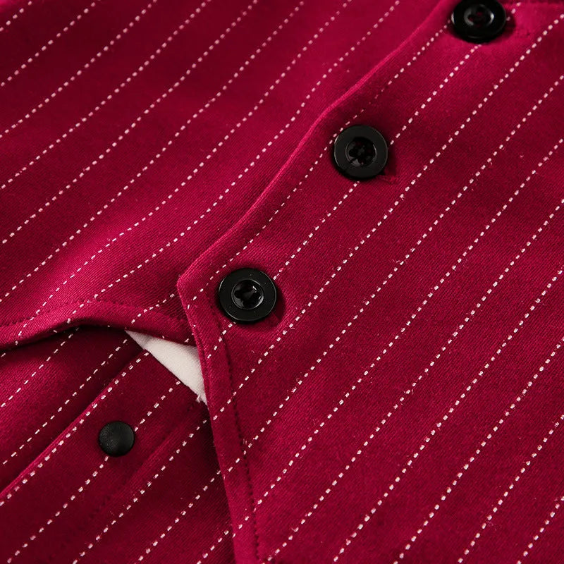 Baby boy in a wine red long-sleeve cotton gentleman jumpsuit with a single-breasted closure.
