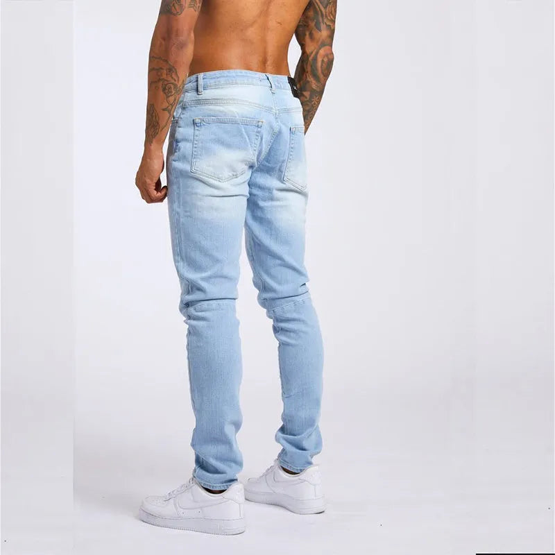 Men's slim fit high waist cotton jeans in light blue or black, sizes 28 to 36