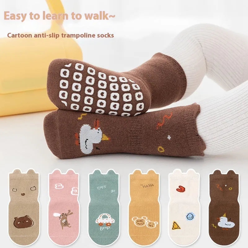 Cotton short tube socks in beige smiley face design for children - free size trampoline socks