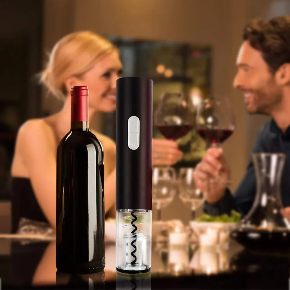 Black automatic electric wine bottle opener with foil cutter on a kitchen counter.