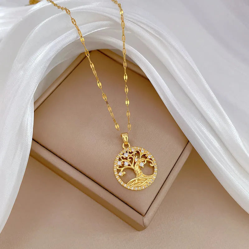 Gold-plated adjustable necklace with a mother of pearl and full rhinestone zircon cross pendant on a lip chain.
