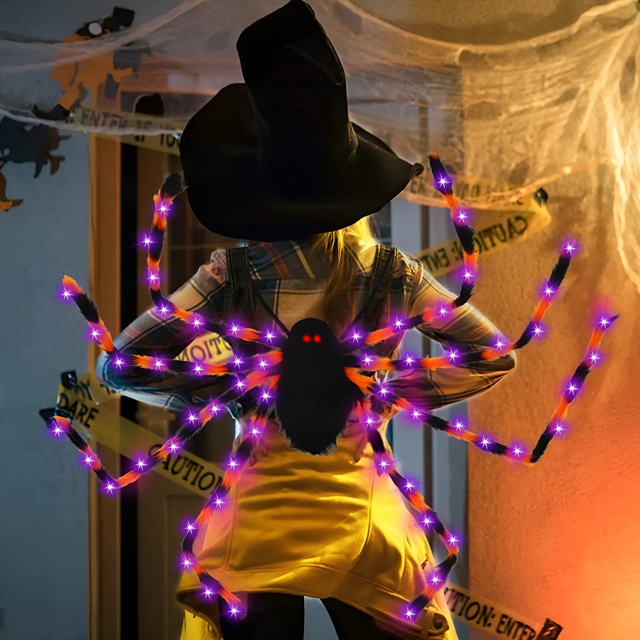 Orange purple light Halloween spider backpack with LED lights on plush fabric.
