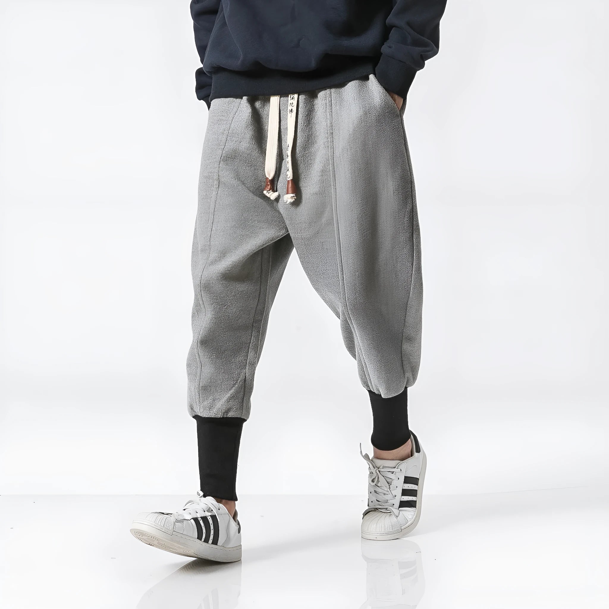 Teen loose fit harem casual pants in dark grey with elastic waist and slant pockets