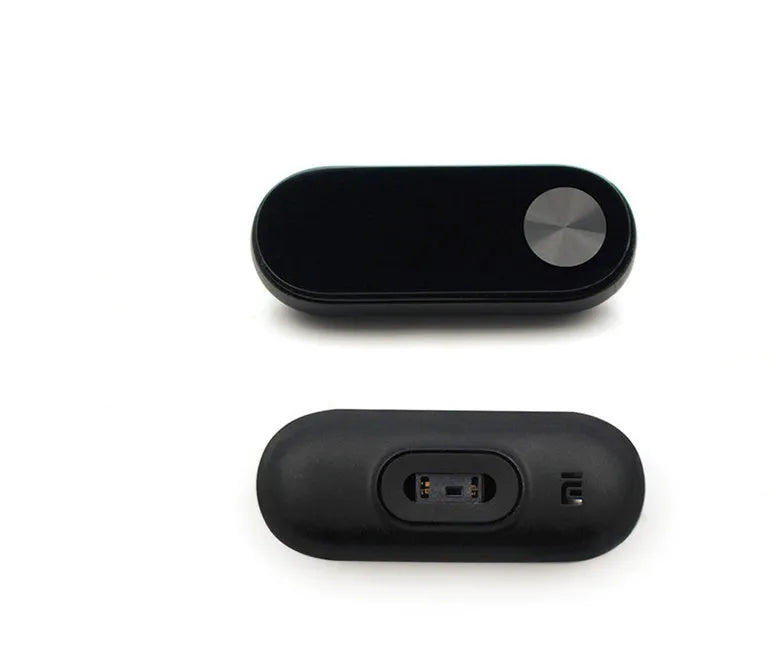 Xiaomi Mi Band 2 black fitness tracker with OLED screen on an adjustable wrist strap.