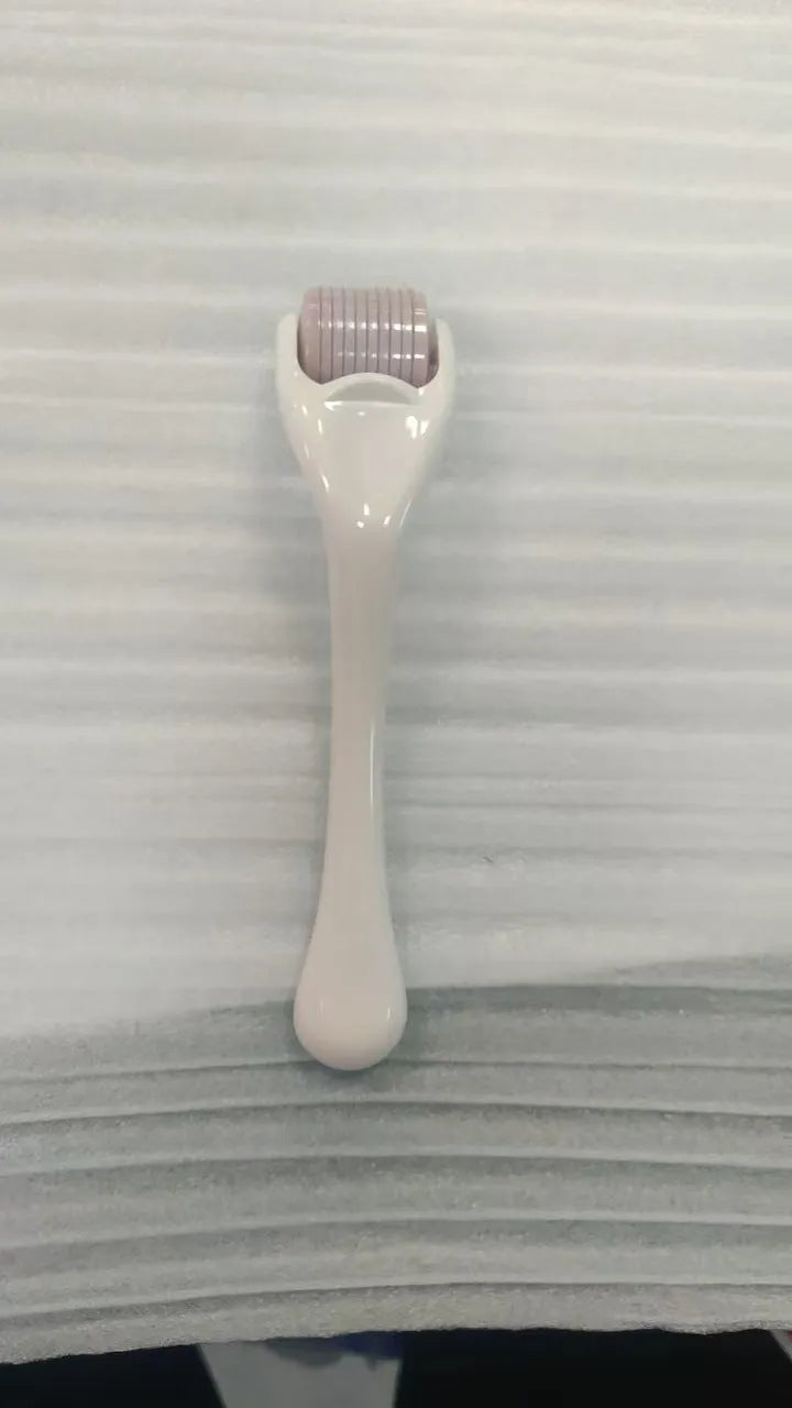 540 micro needle derma roller with mechanical design in various handle and wheel colour combinations