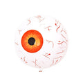 Green Halloween balloon with red bloodshot eyeball design, inflated to a round shape.