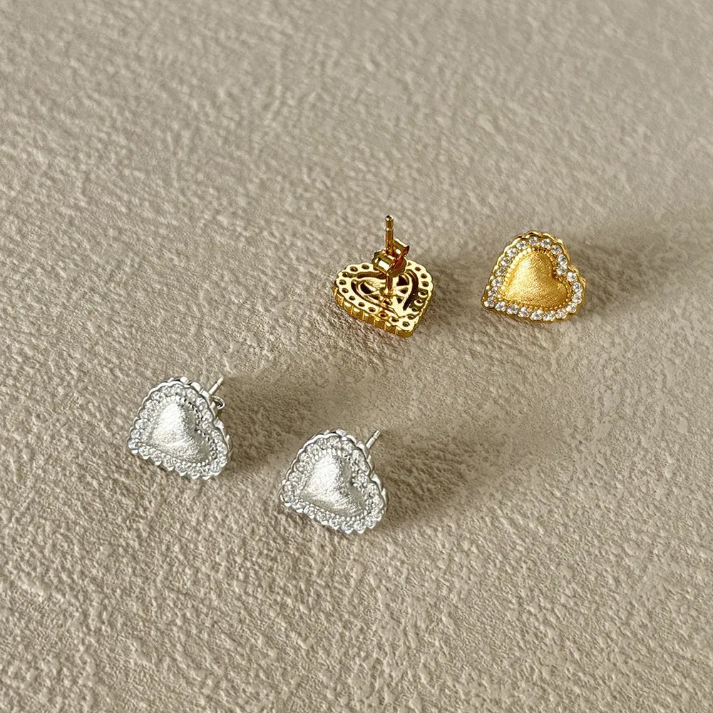 925 silver heart-shaped stud earrings 11.3x11.5mm white finish on ear