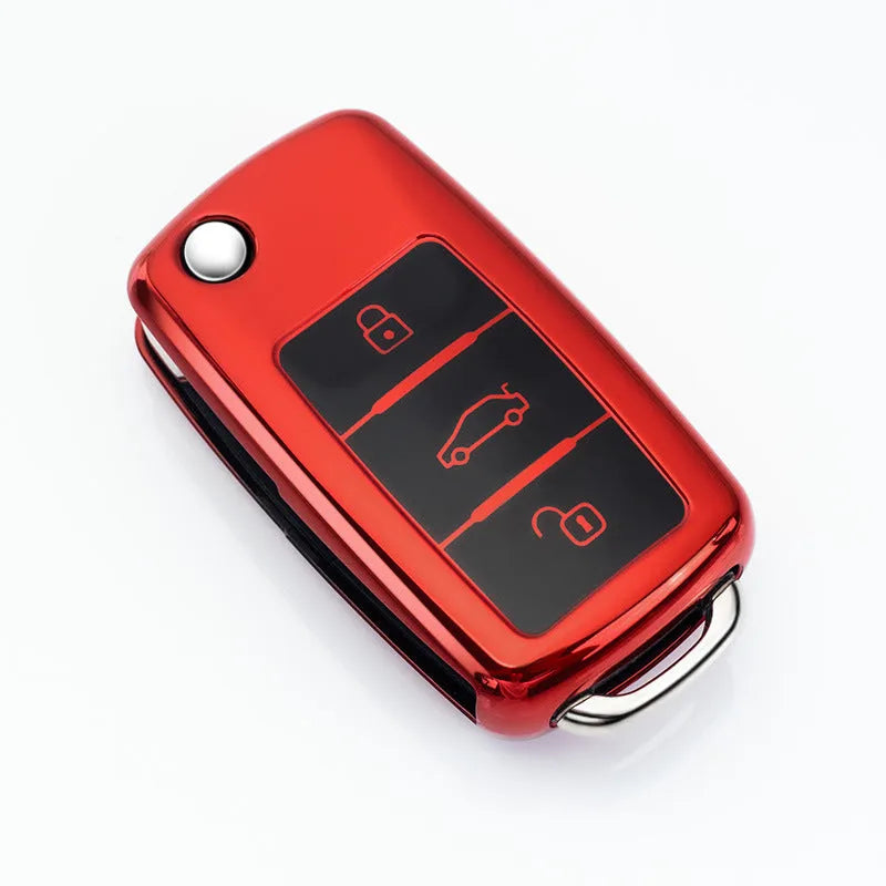 VW Model A folding car key with a blue TPU protective case fitted over the remote fob.