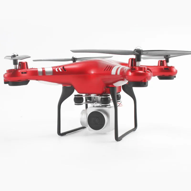 Black HD aerial photography drone with alloy body and remote control handle on a table.