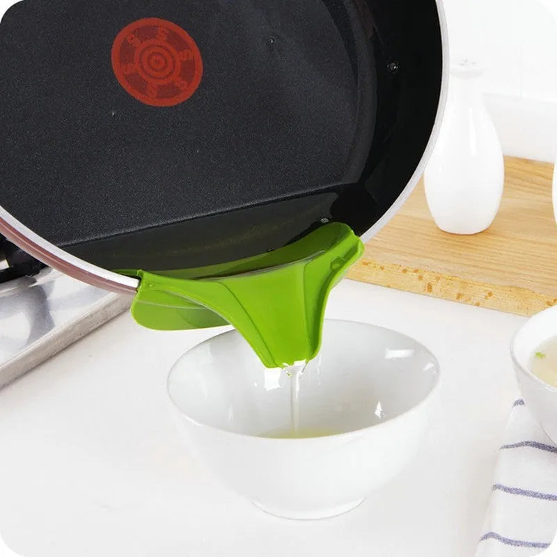 Green silicone kitchen funnel with clamp for round pots showing 12cm measurement