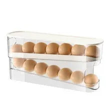 White plastic slide-out egg tray for refrigerator door with automatic dispenser and clear view window.