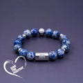 Little Lion Trendy ethnic bracelet made from bodhi seeds in black and white geometric design.