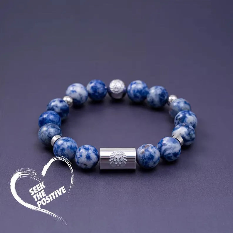 Little Lion Trendy ethnic bracelet made from bodhi seeds in black and white geometric design.