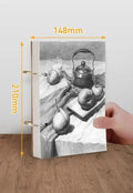 8K thickened sketchbook open showing coil binding and marker-ready paper texture