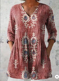 Women's printed loose dress with wide waist and 3/4 ruffle sleeves in a floral wave pattern.
