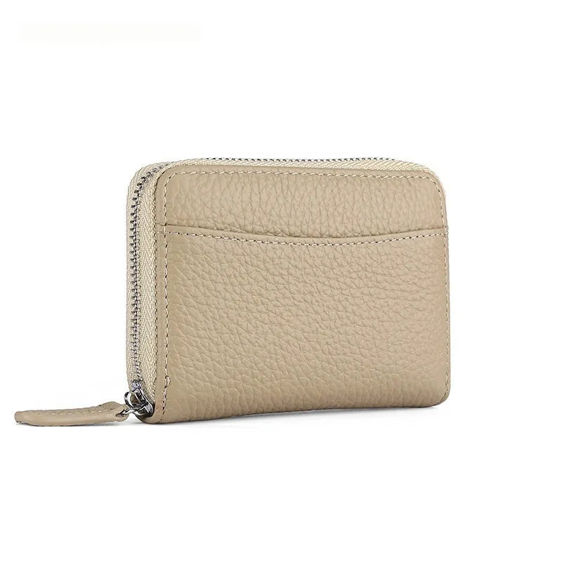 Genuine leather zipper coin purse in solid colour with anti-theft feature and sewing line detail.