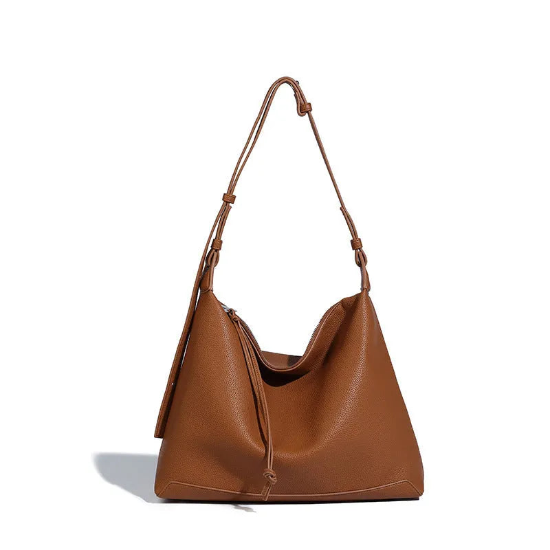 Large capacity caramel coloured underarm shoulder messenger bag made from soft PU material