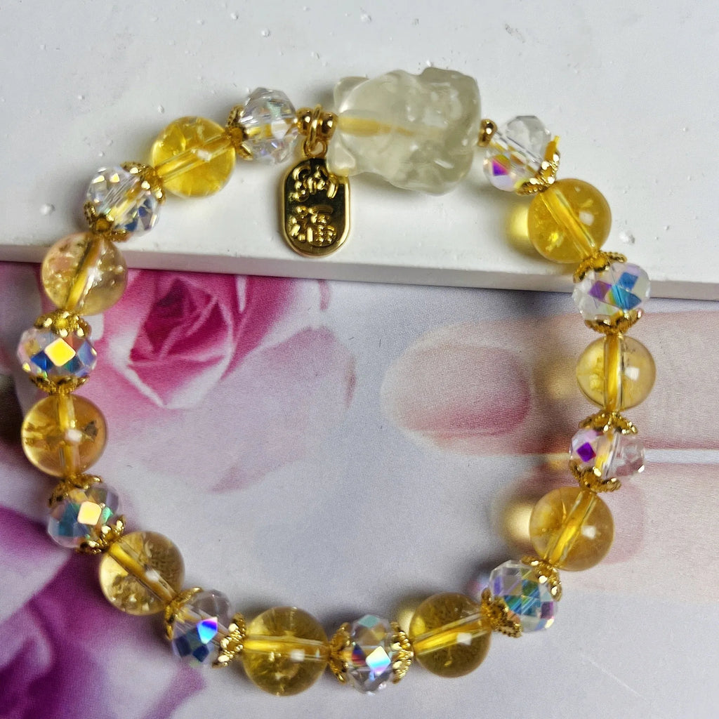 Handmade women's bracelet with citrine crystal stones in nine-tail fox design