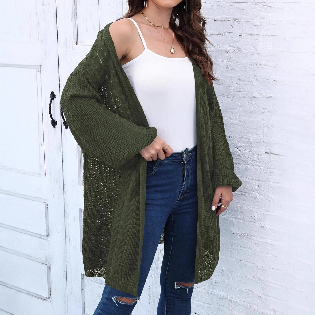 Loose-fit women's acrylic sweater coat in army green, shown on a hanger.