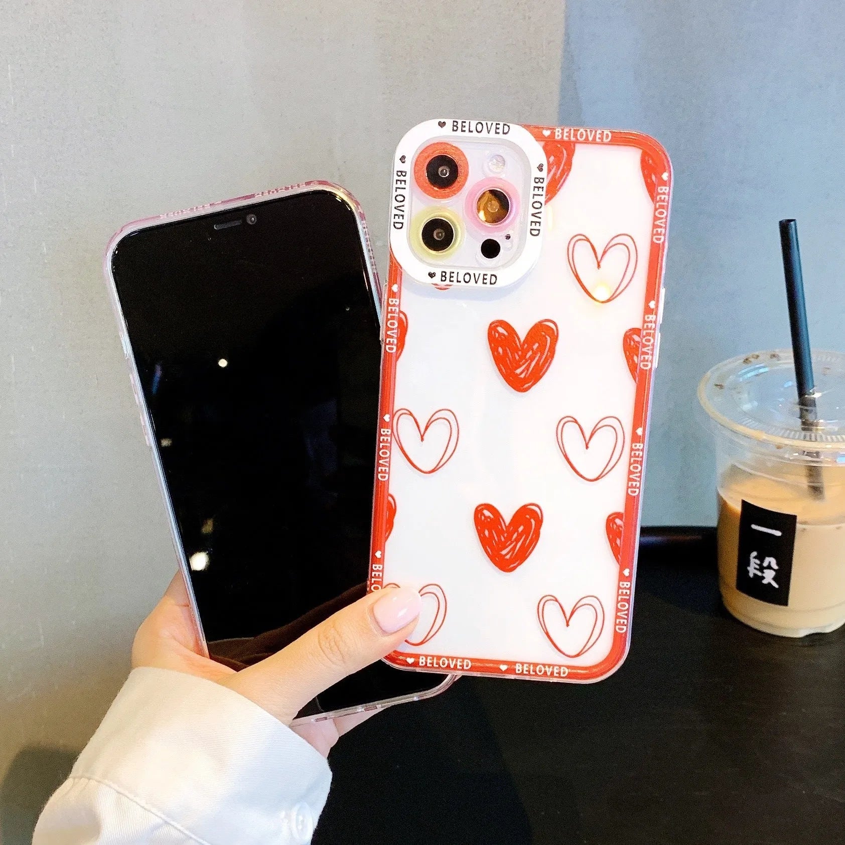 Pink mobile phone case with love heart and angel eyes design for iPhone.