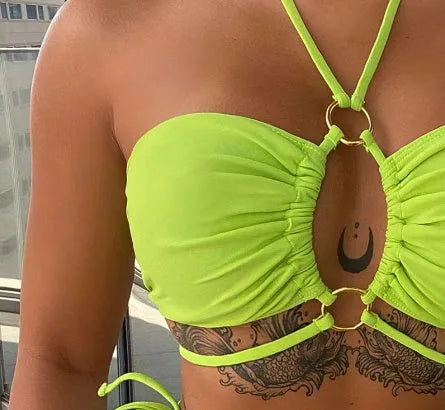 Yellow green women's lace-up triangle bikini swimsuit on white background
