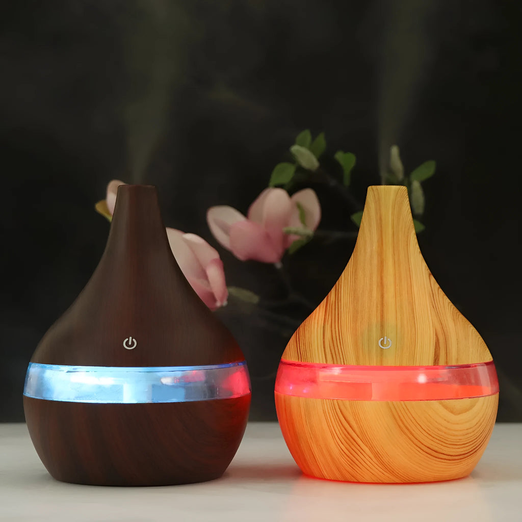 Columnar USB mini air purifier and humidifier in wood grain finish on a desk