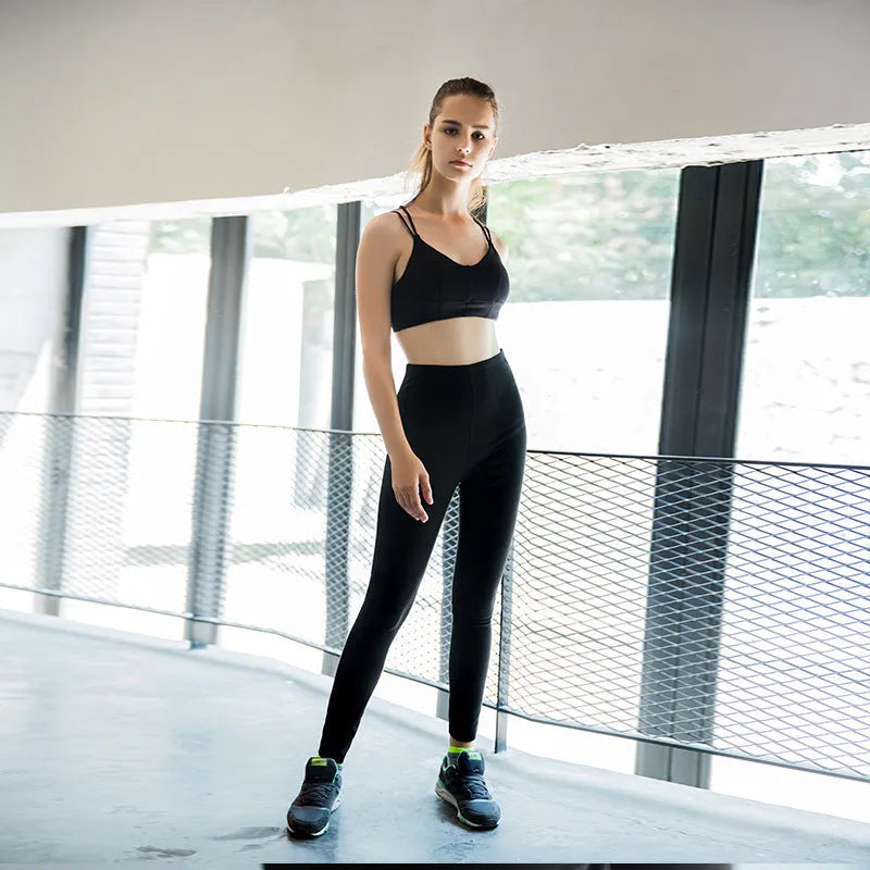 Women's loose breathable yoga pants sweat suit set in black, high-waist, 95% polyester blend, side view