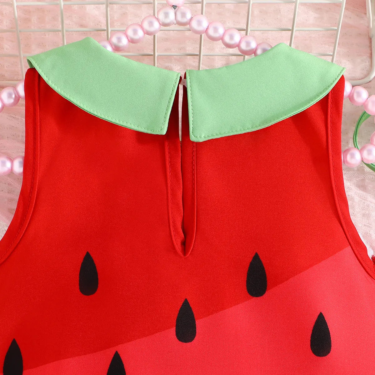 Girls fruit printed sleeveless dress in cartoon pattern, polyester fibre, available in sizes 6 months to 3 years
