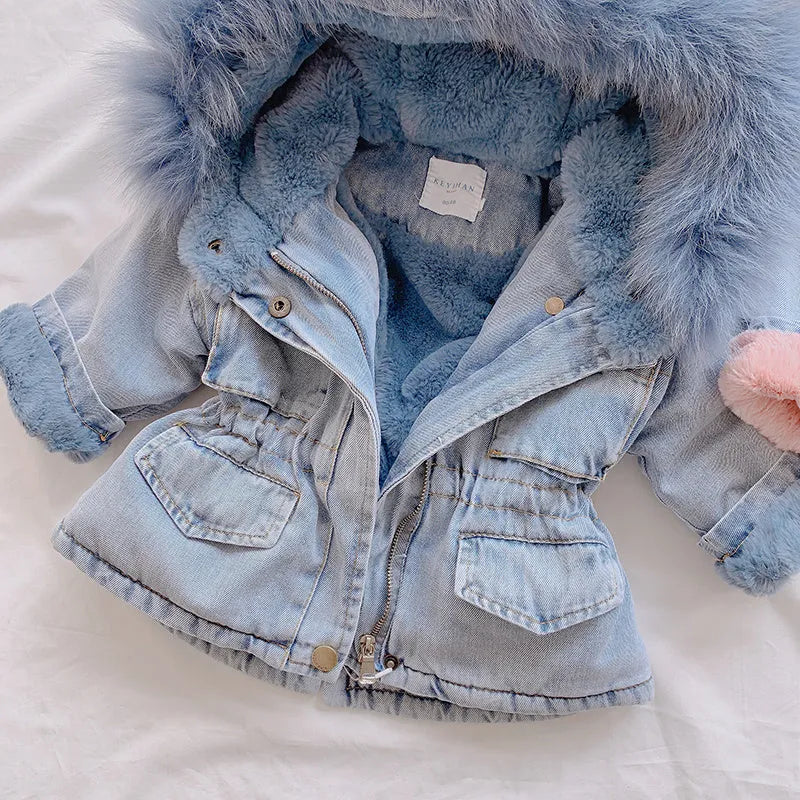 Blue denim jacket for girls with a fleece lining and attached hood.