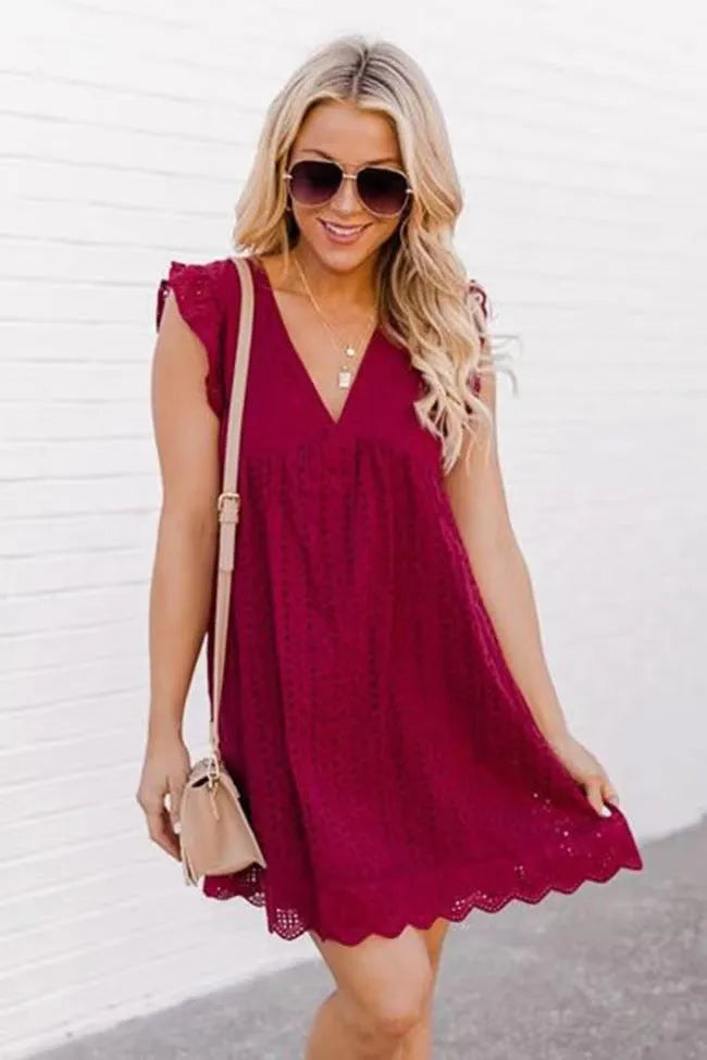 Sleeveless lace dress with pockets, V-neck, jacquard cutout pattern, A-line midi length, available in multiple colours