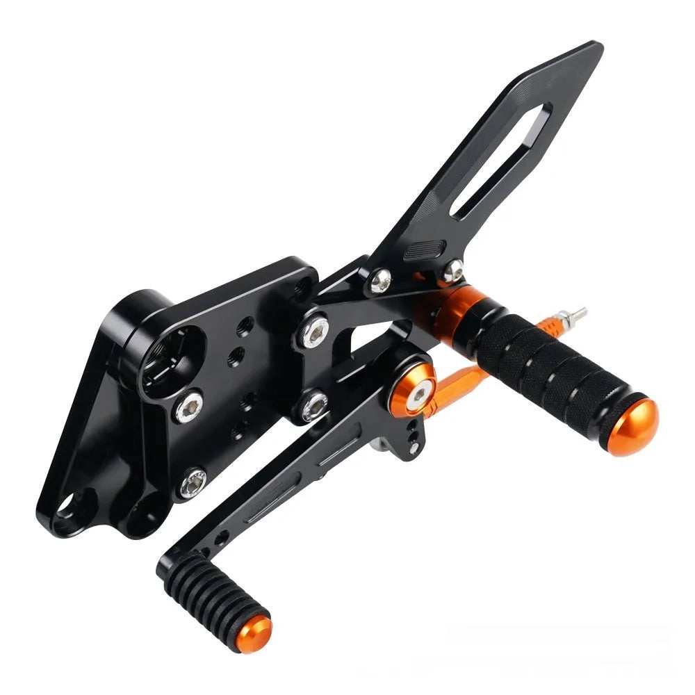 KTM DUKE motorcycle rear pedal support assembly bracket kit in black or orange