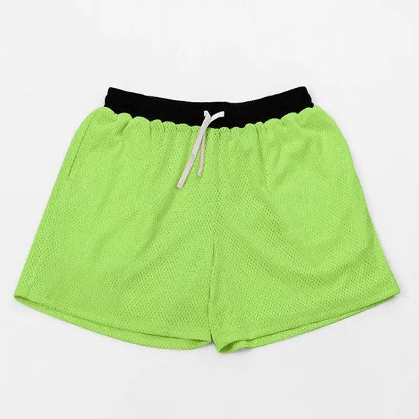 Men's solid colour mesh quick-drying shorts for summer running and fitness.