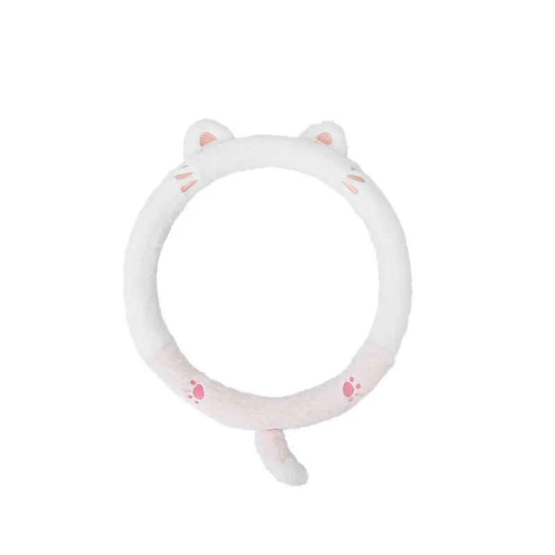 Rabbit fur plush steering wheel cover with embroidered panda, fitted on a 38cm car steering wheel.