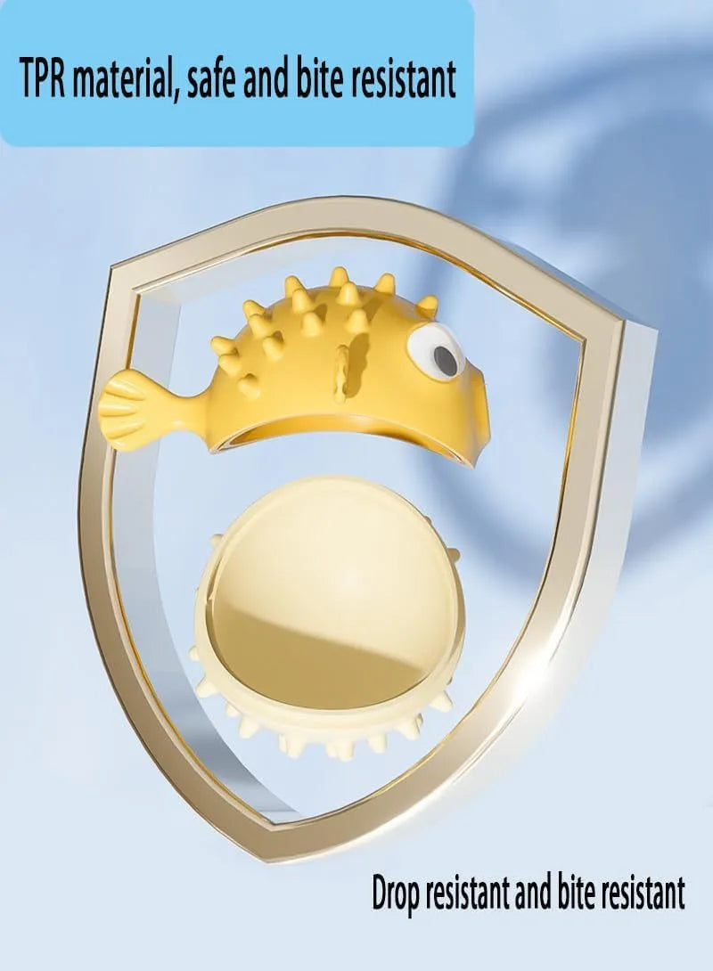 Green fish-shaped interactive dog toy with treat hole and textured surface.